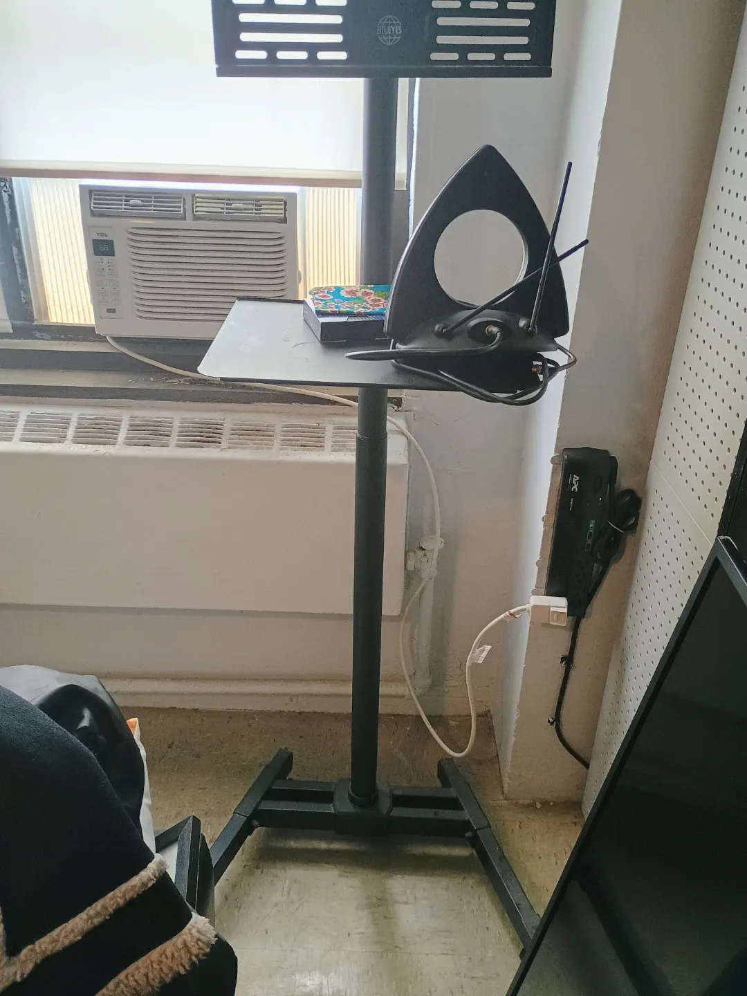 Rolling TV Stand with Mount and one shelf.