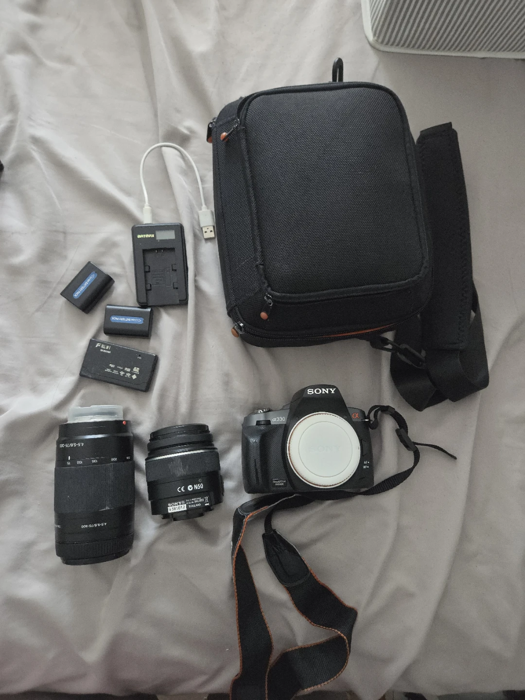 Sony Alpha DSLR Camera Bundle with Two Lenses and Accessories