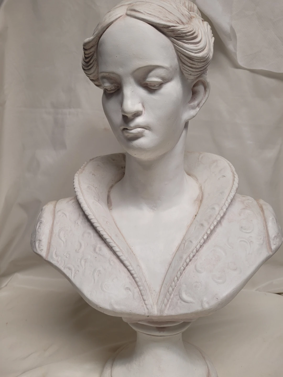White Bust Sculpture of a Woman