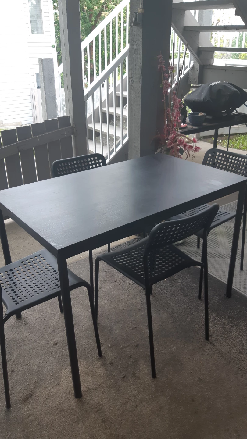 Black table with 4 chairs