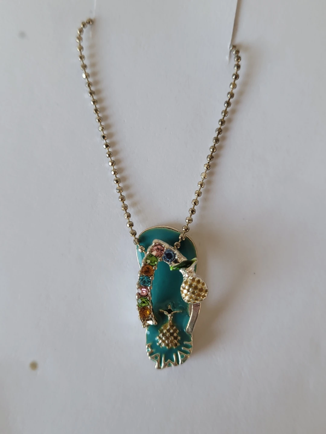 Flip flop pendant necklace with colourful gems