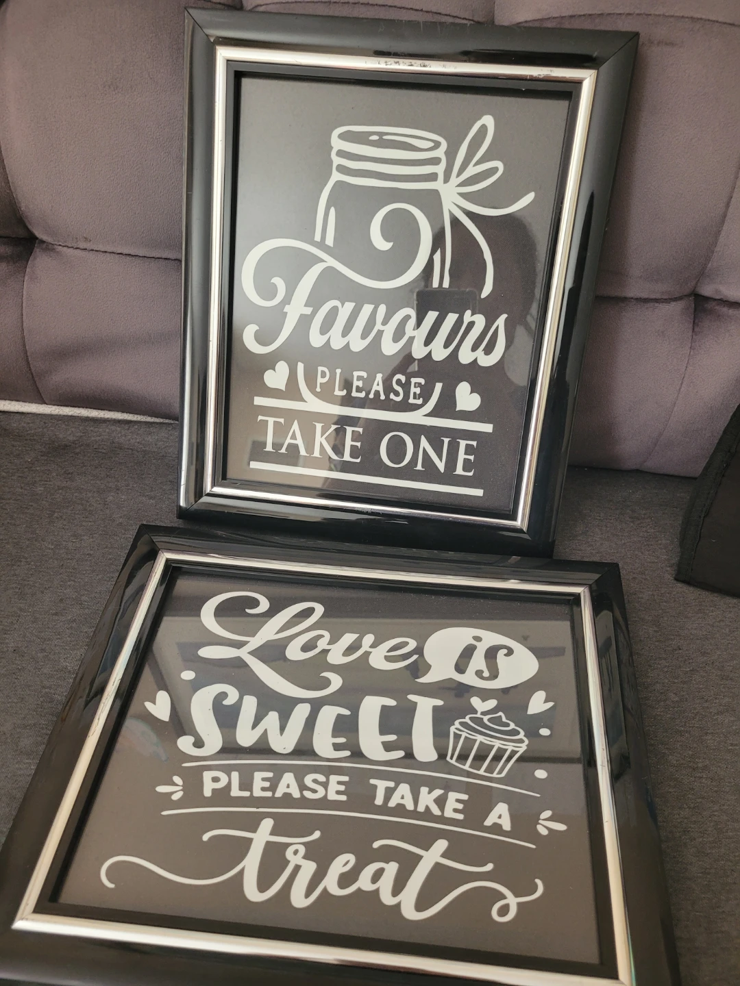 2 Picture frames that has been used as a Sign Frames