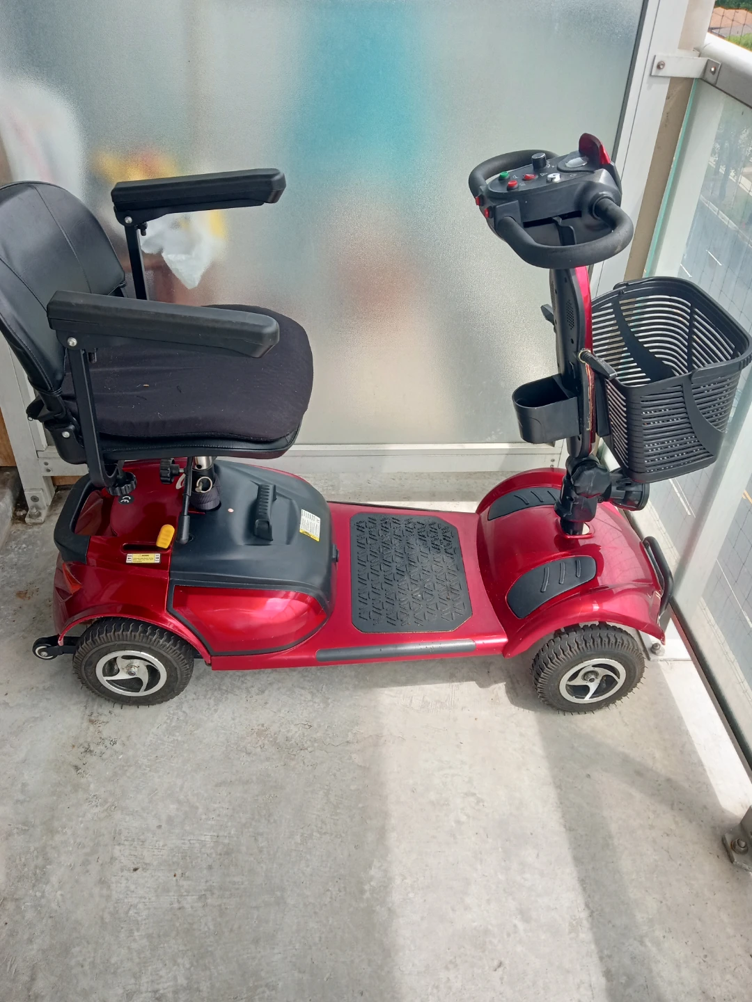 Red Mobility Scooter with Basket