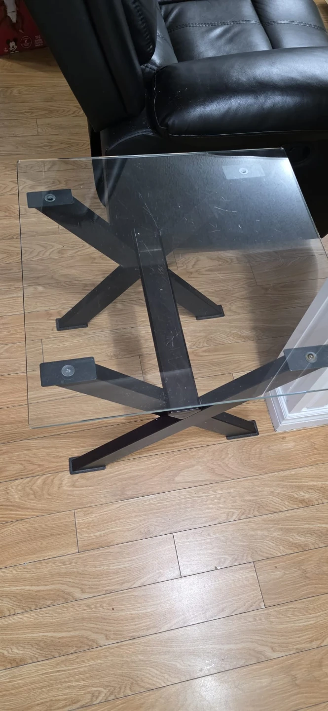 Glass coffee table with black metal base - photo 4