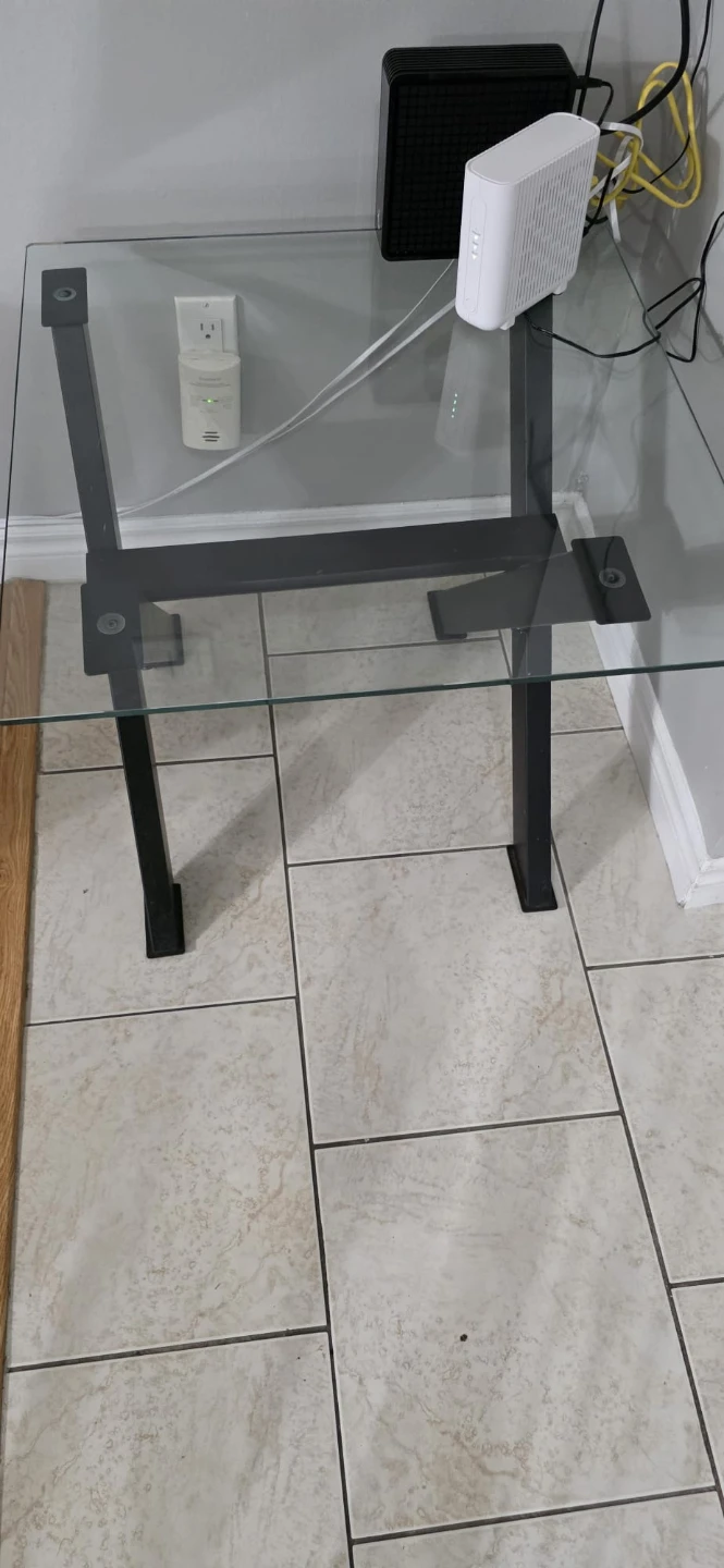 Glass coffee table with black metal base - photo 5