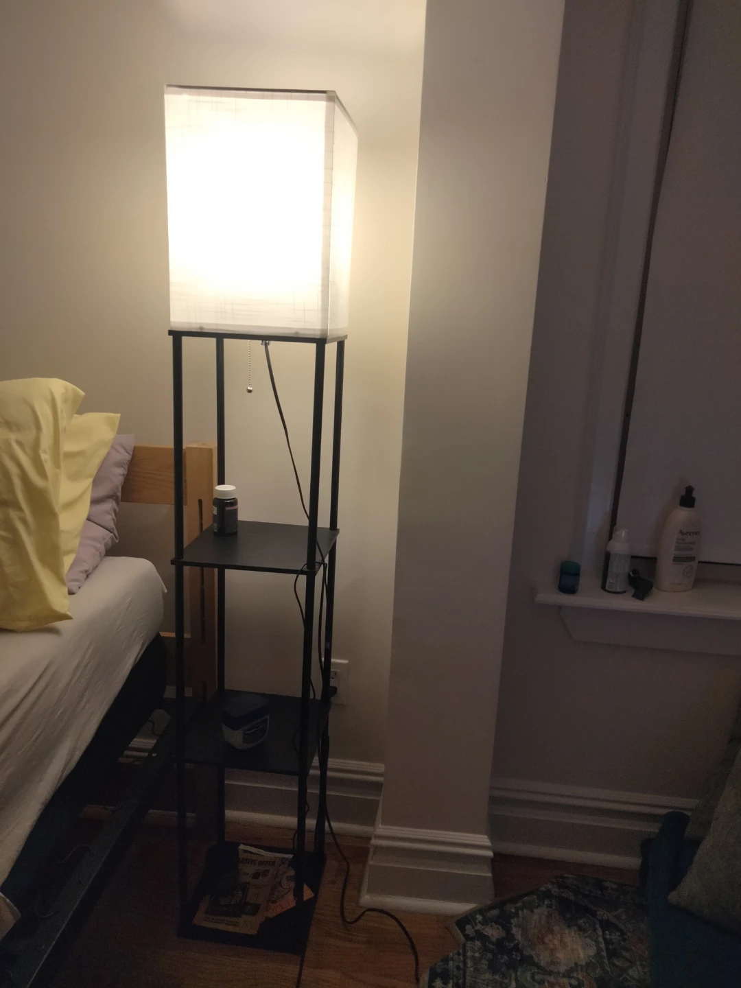 Floor lamp with shelves