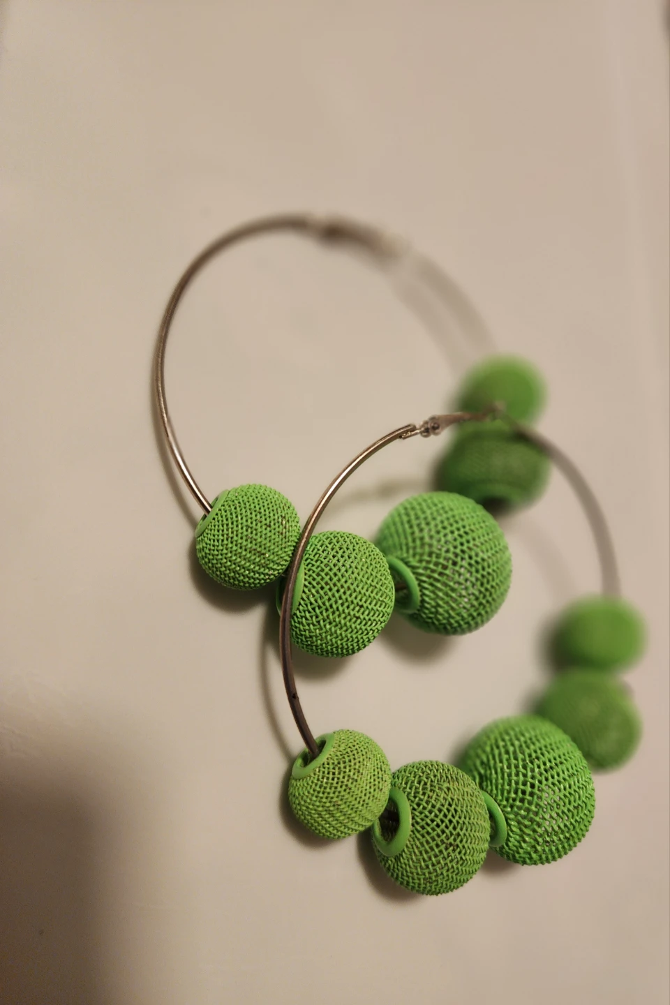 Green Hoop Earrings with Textured Balls