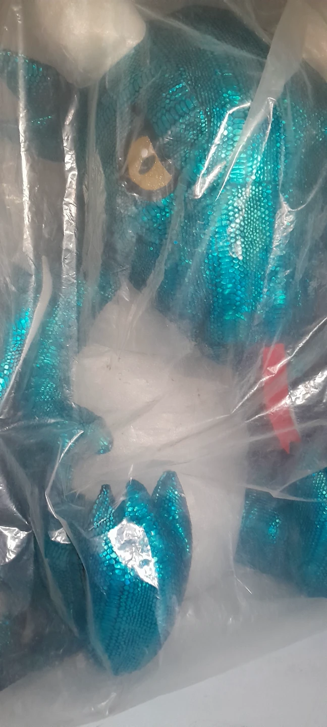 Teal sparkly dragon plush toy
