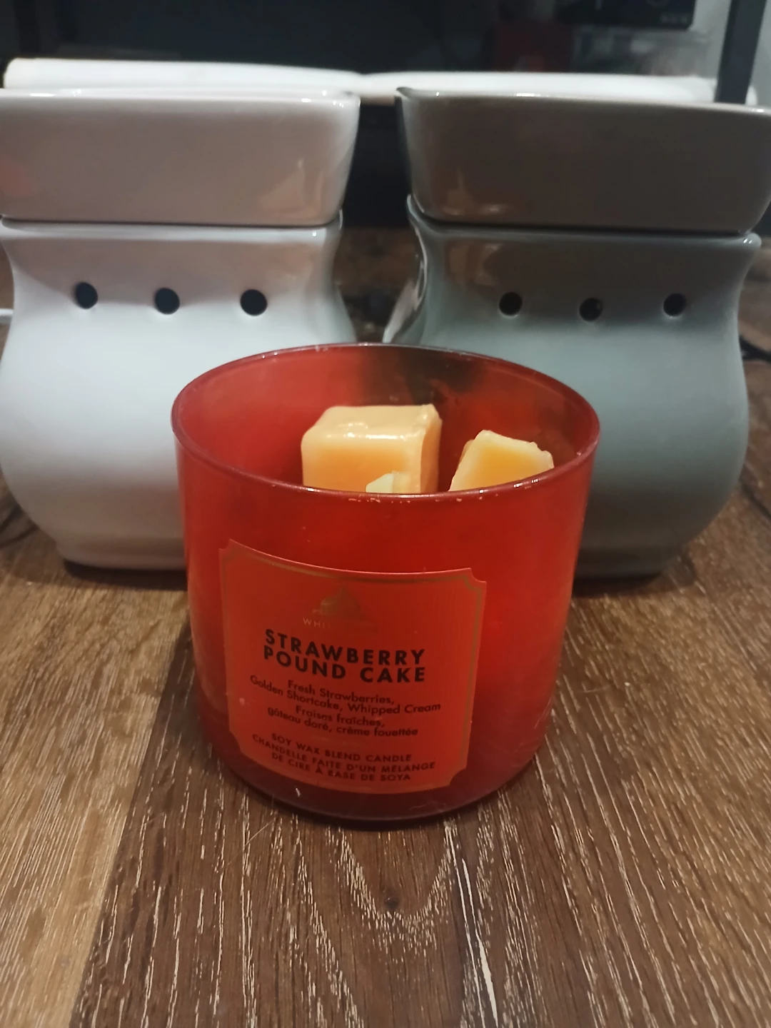 Two senstsy warmers and a half a brick