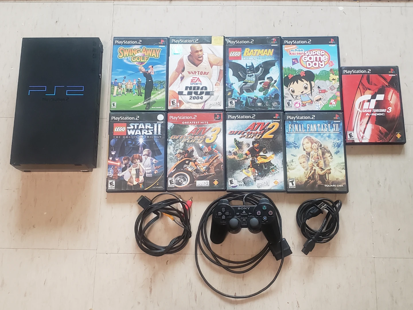 PlayStation 2 Console Bundle + 9 games + controller + cables