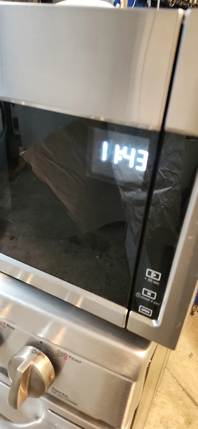 GE Stainless Steel Gas Range and whirlpool Microwave Oven Combo - photo 4