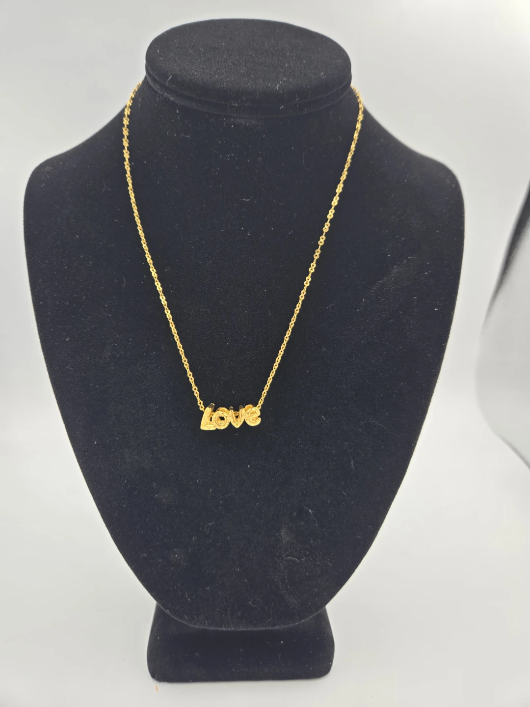 Gold Tone 'Love' Pendant Necklace
