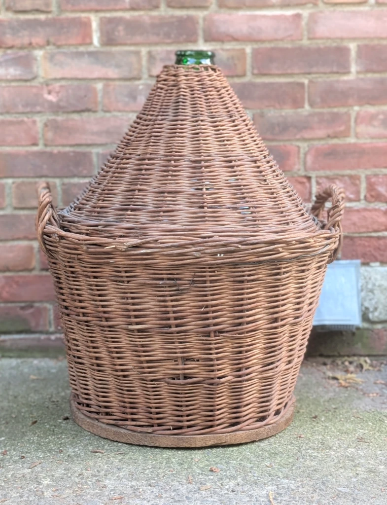Large Green Demijohn in Wicker Basket