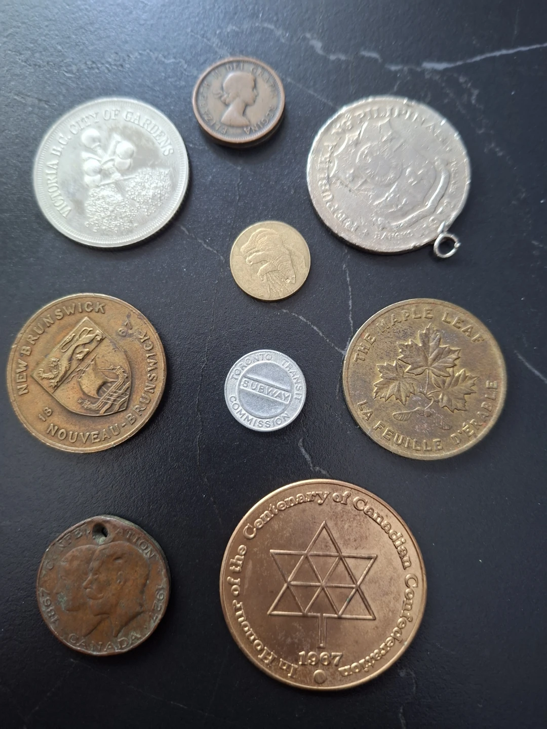 Collection of assorted coins and tokens