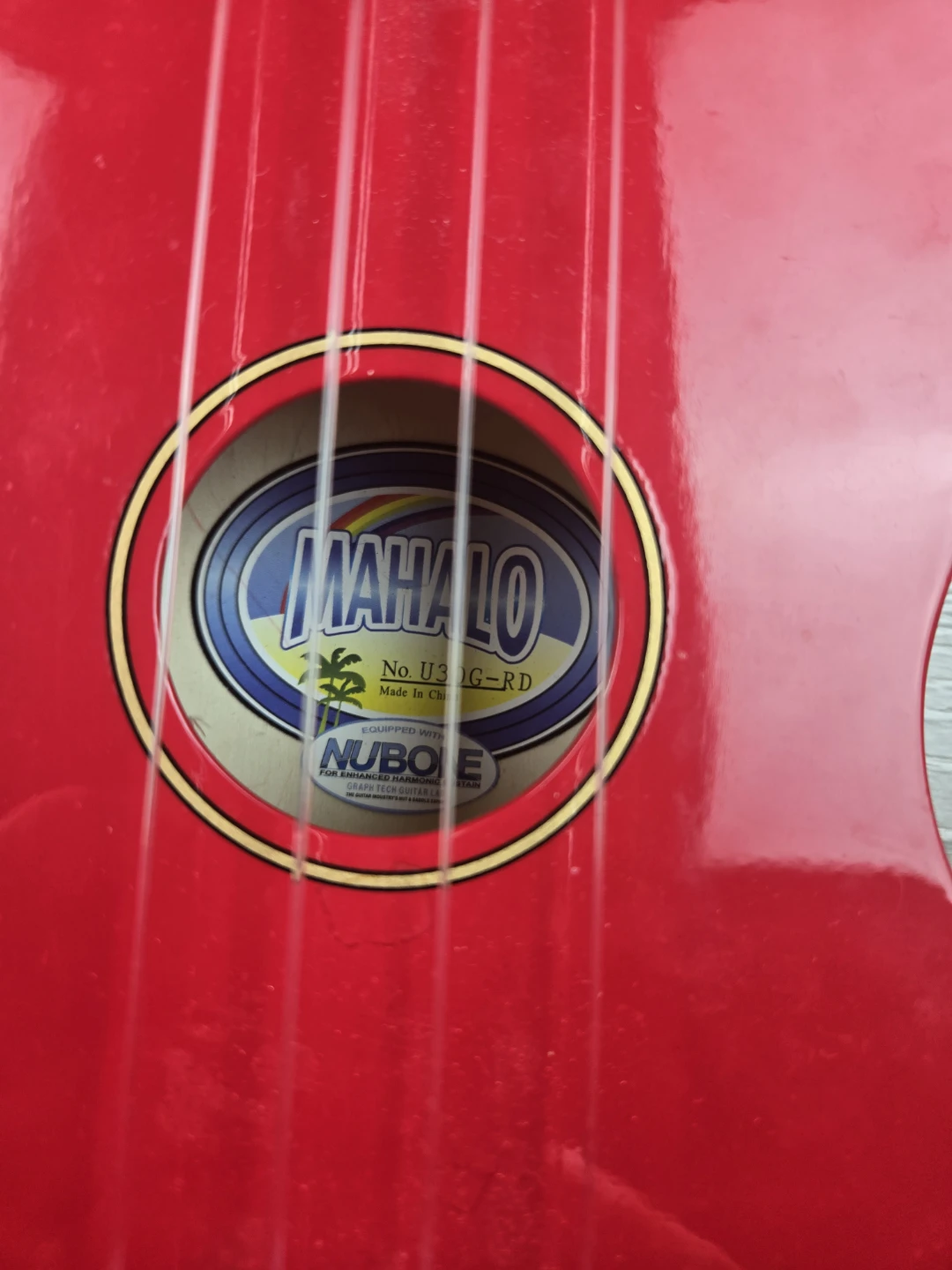 Red real wood ukelele with tuner - photo 2