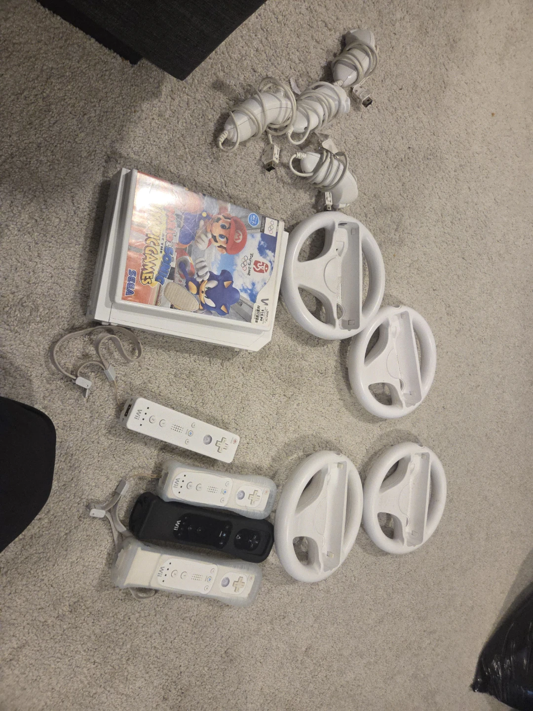 Nintendo Wii Games Bundle with Controllers and Steering Wheels