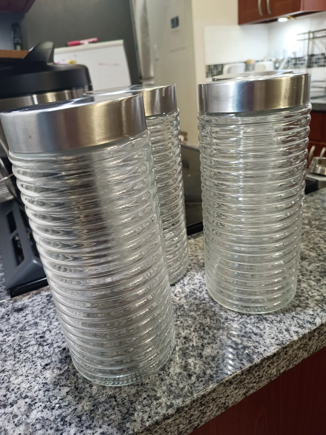 Set of 4 Clear Glass Canisters with Silver Lids - photo 2