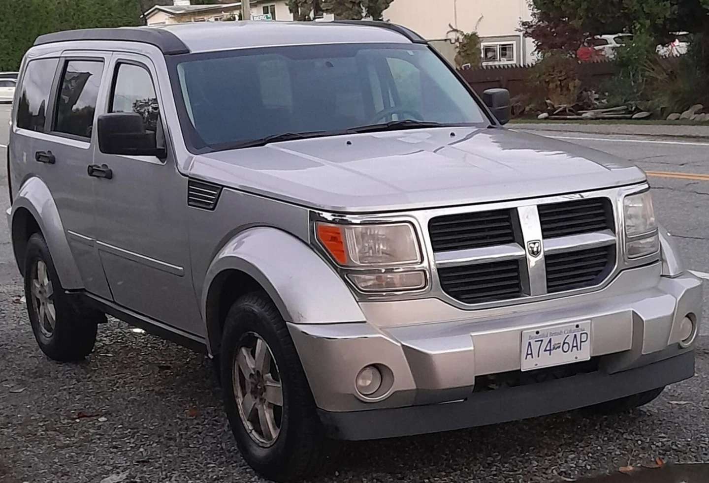 Silver Dodge Nitro SUV - photo 2