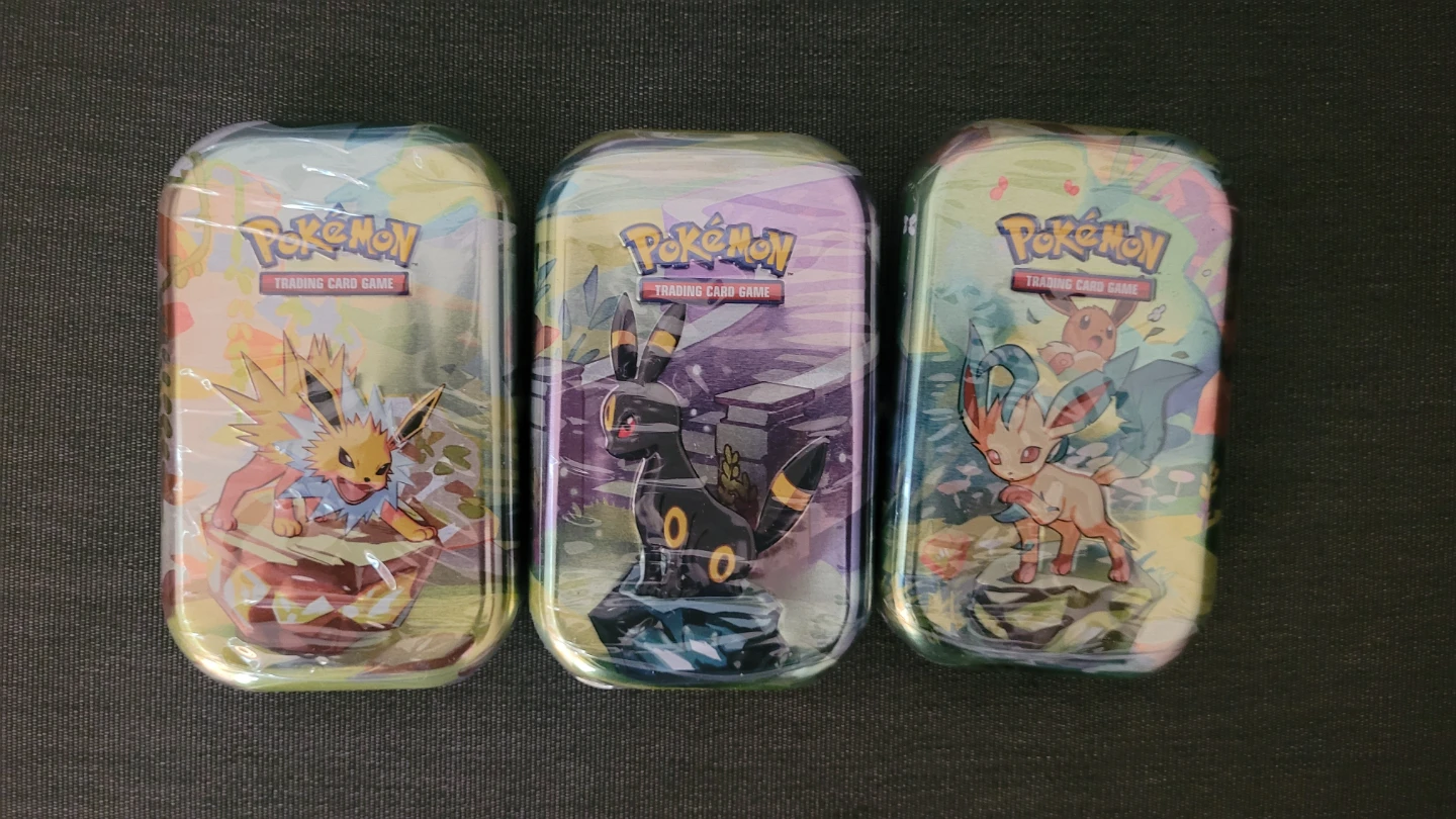 Pokemon TCG Prismatic Tins