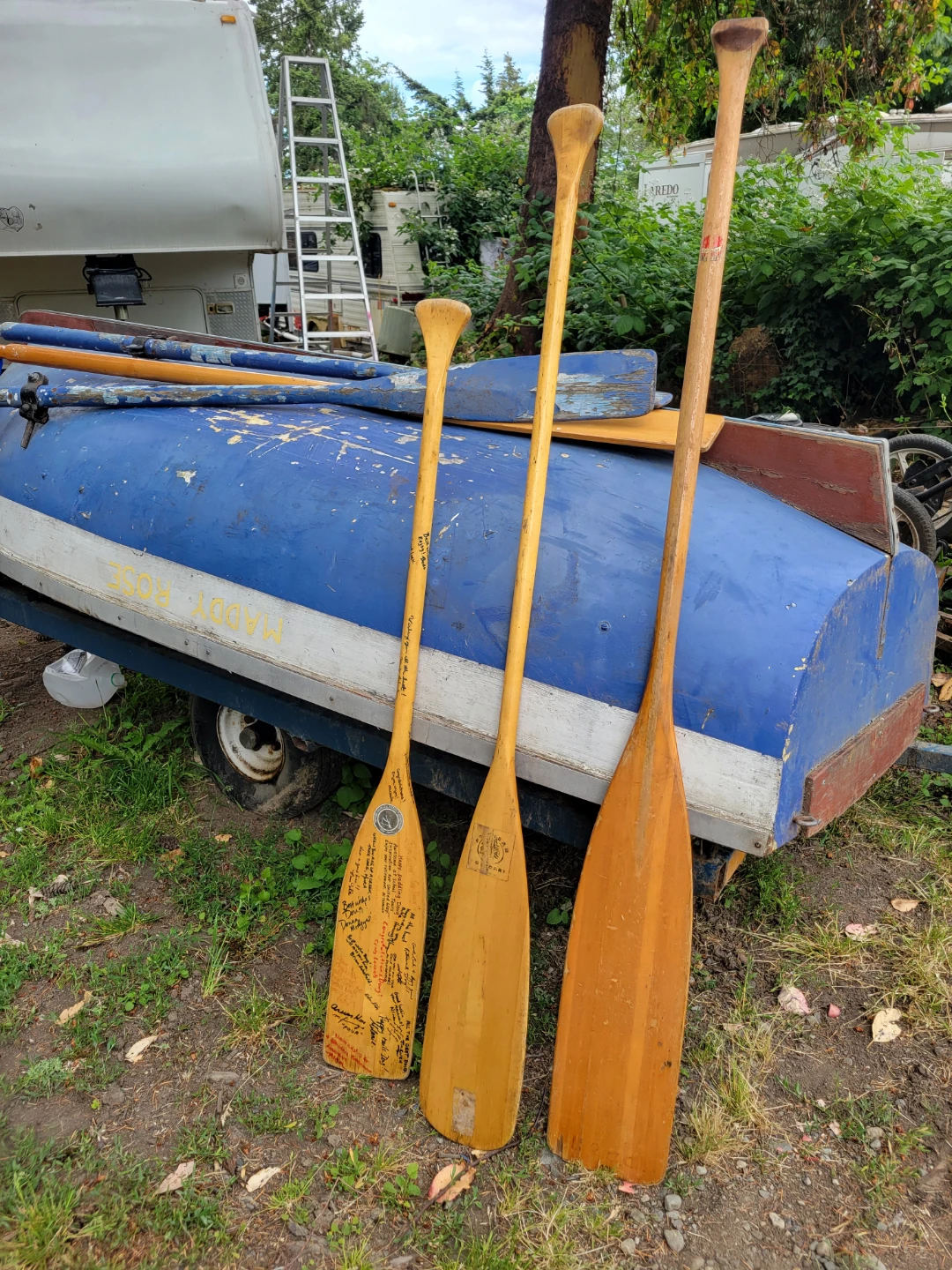 Rowboat with paddles and life jackets - photo 2