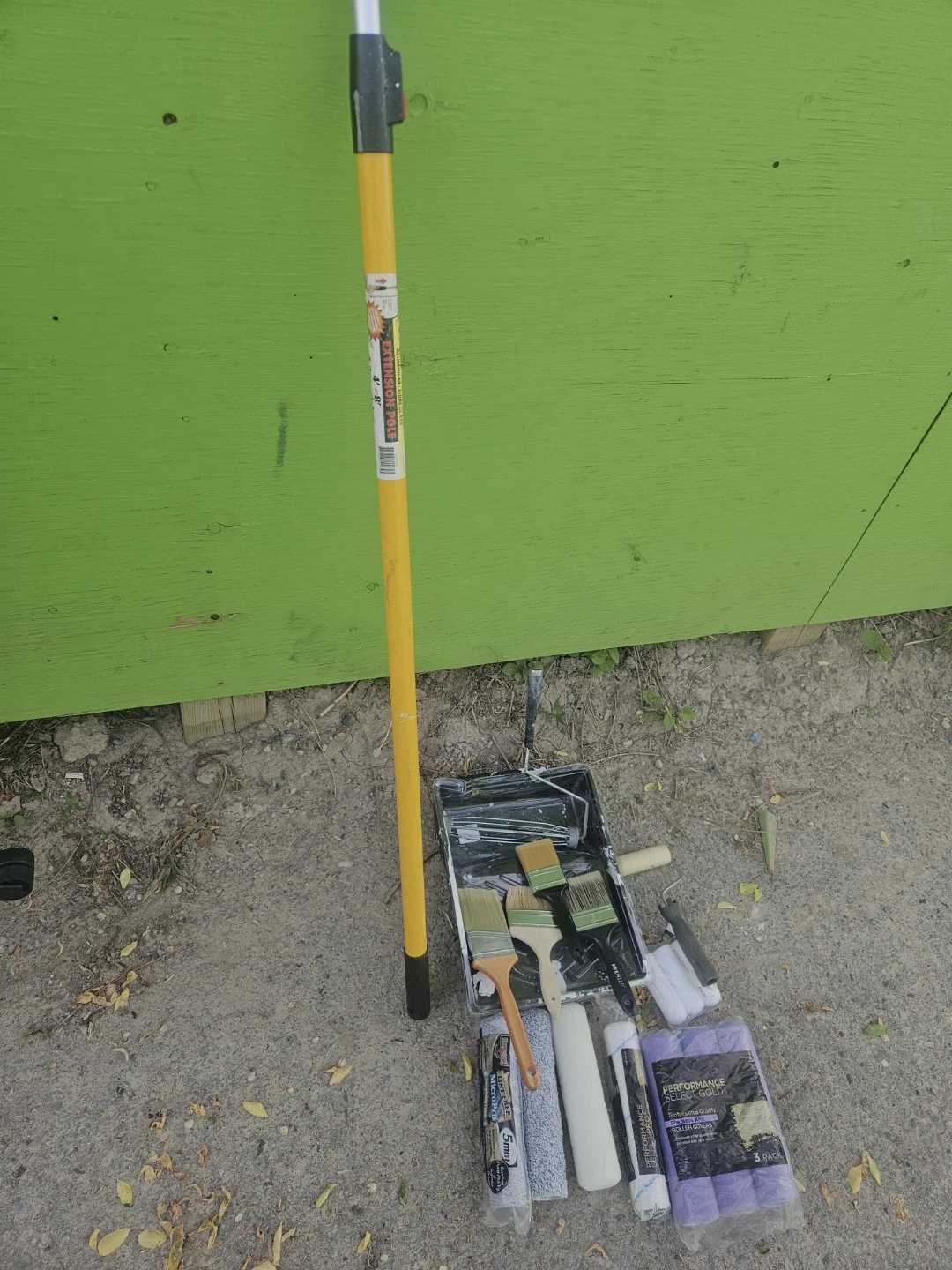 Painters extendable pole, new brushes, rollers, tray.