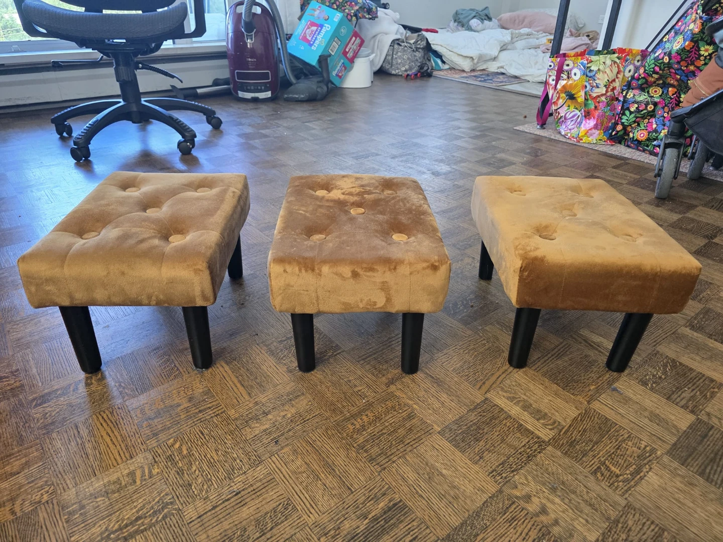 Set of 3 upholstered footstools
