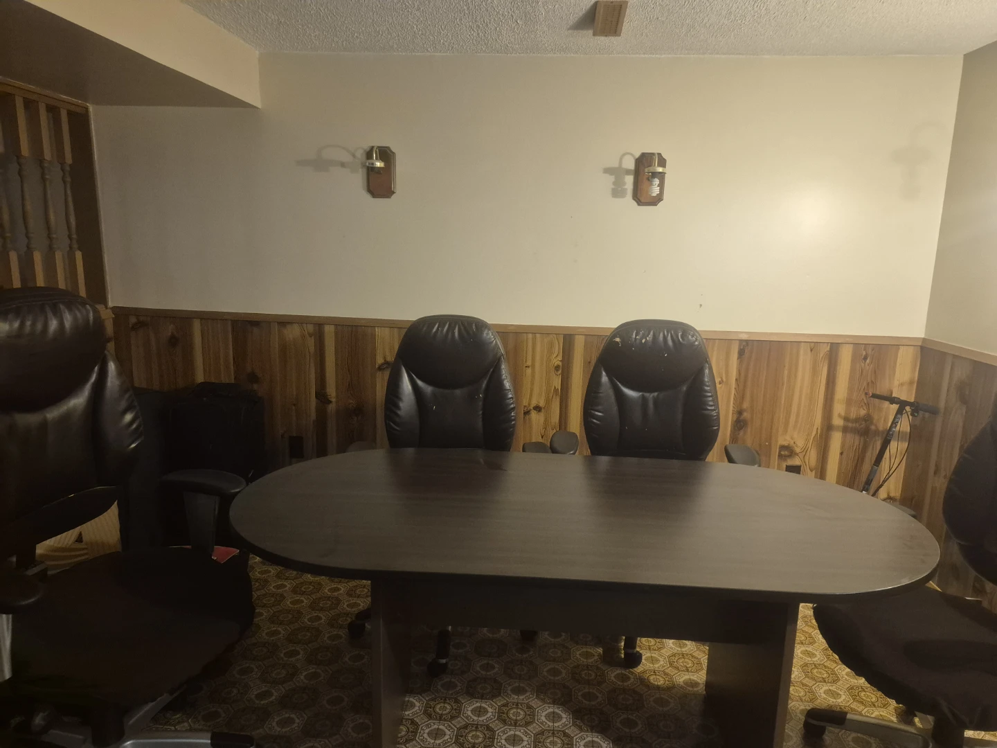Dark Wood Conference Table with Black Leather Chairs
