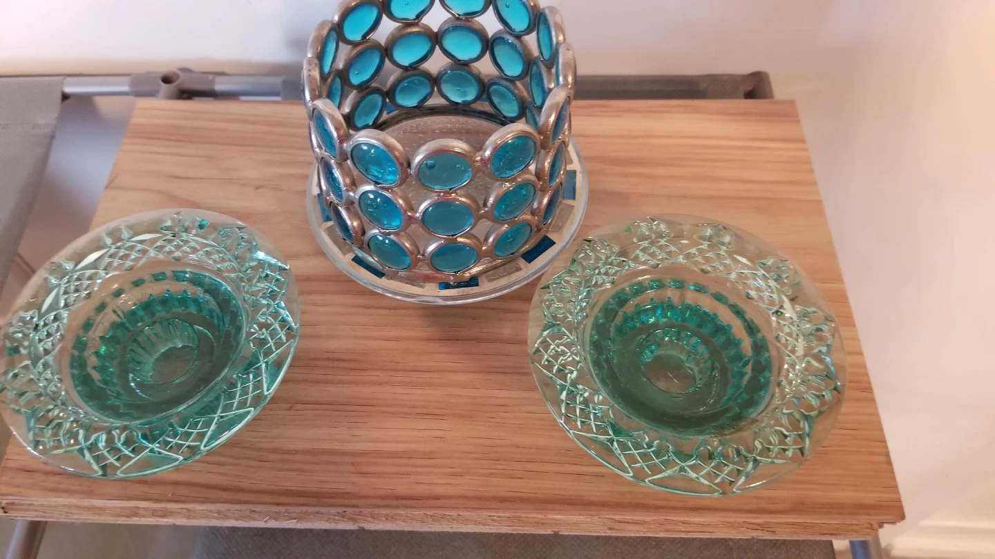 3 Teal Blue Glass Tealight Holders. Pick up only.