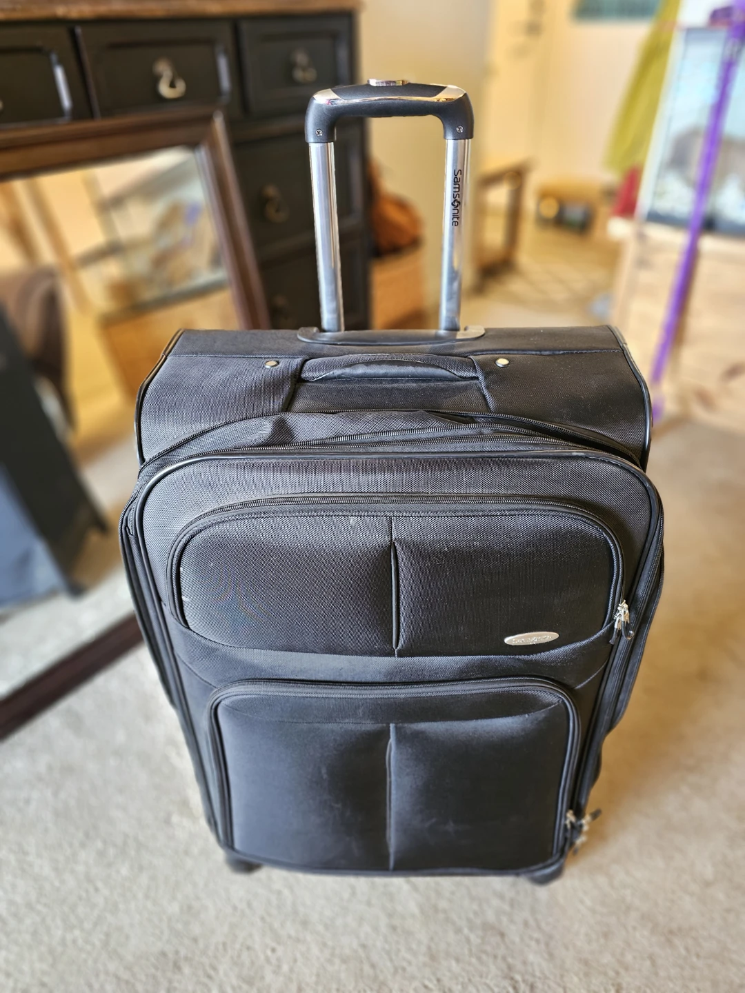 Samsonite Black Rolling Suitcase