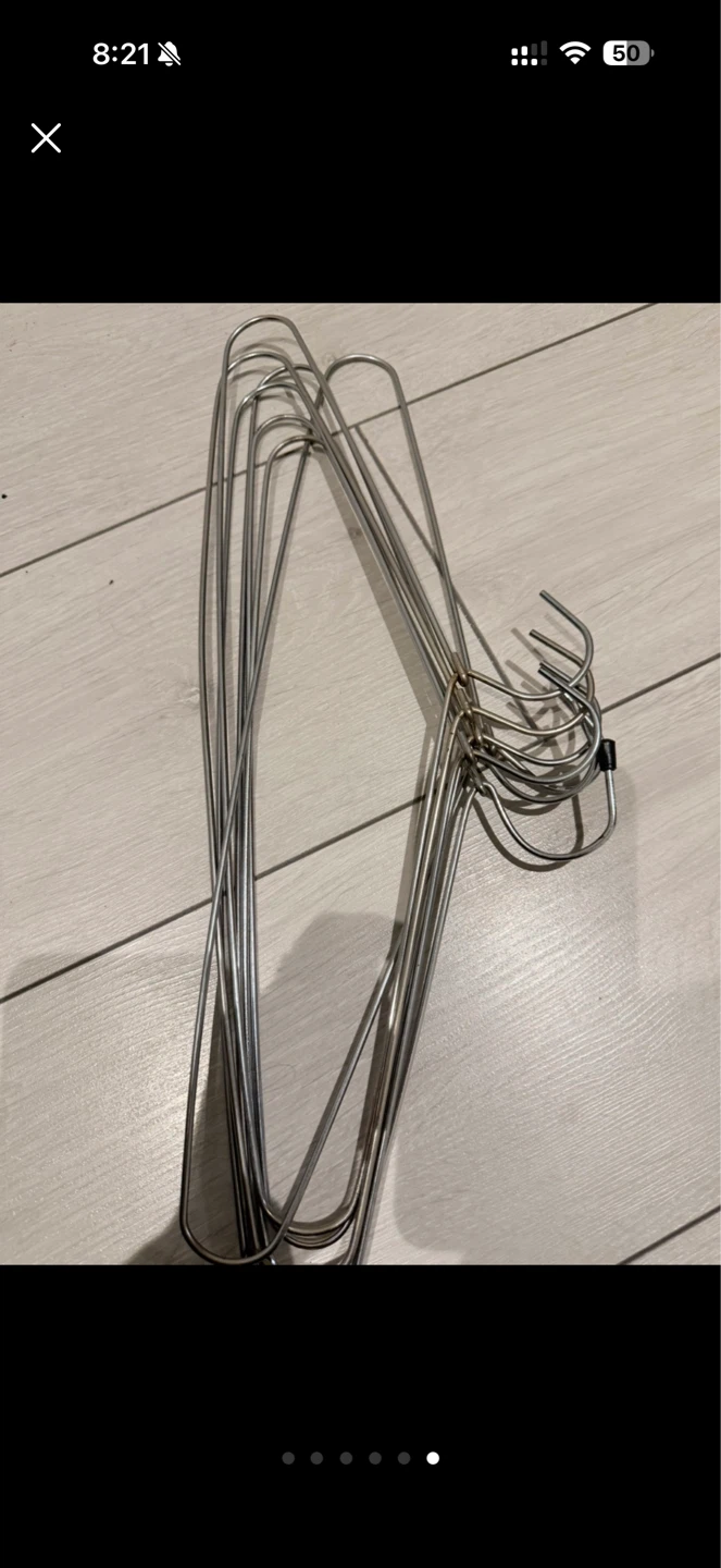 Bundle of Blue and Silver Wire Hangers