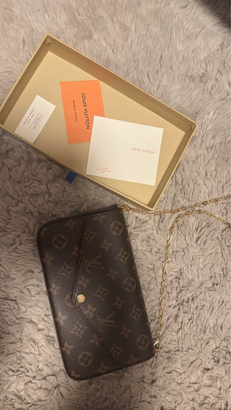 Louis Vuitton Monogram World Tour Clutch with Chain
