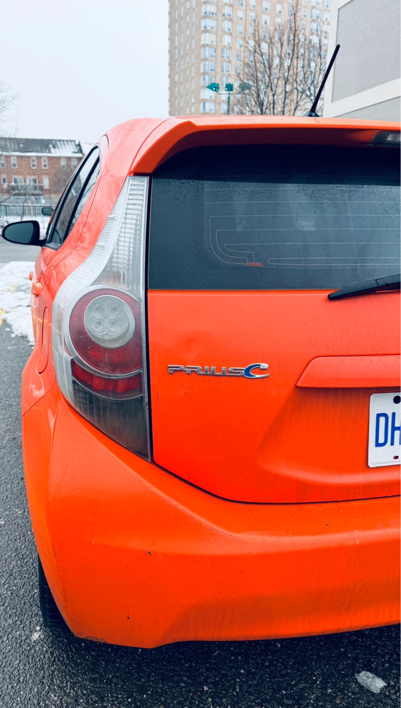 Orange Toyota Prius C Hatchback - photo 2