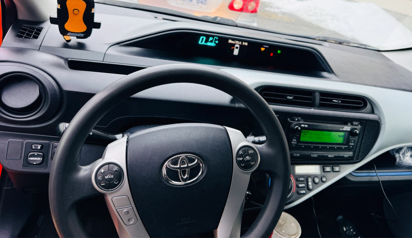 Orange Toyota Prius C Hatchback