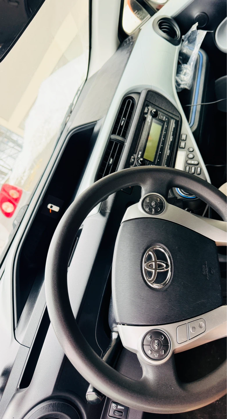 Orange Toyota Prius C Hatchback - photo 3