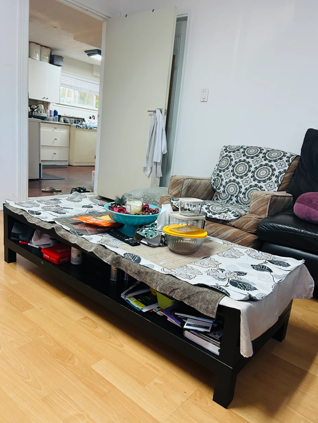 Black coffee table with storage shelf