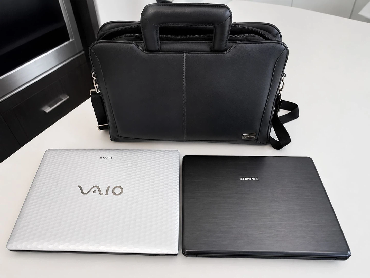 Black Leather Laptop Bag with Sony VAIO and Compaq Laptops