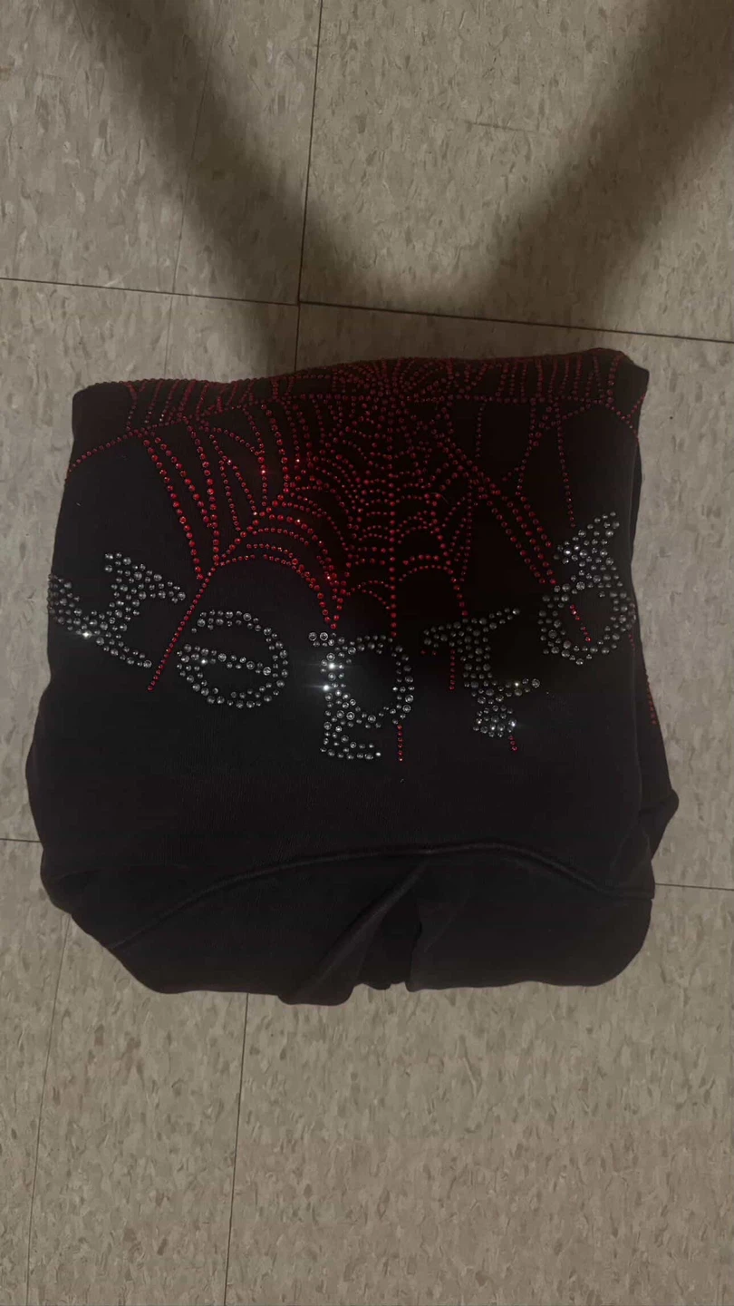 Spider hoodie with rhinestone web design