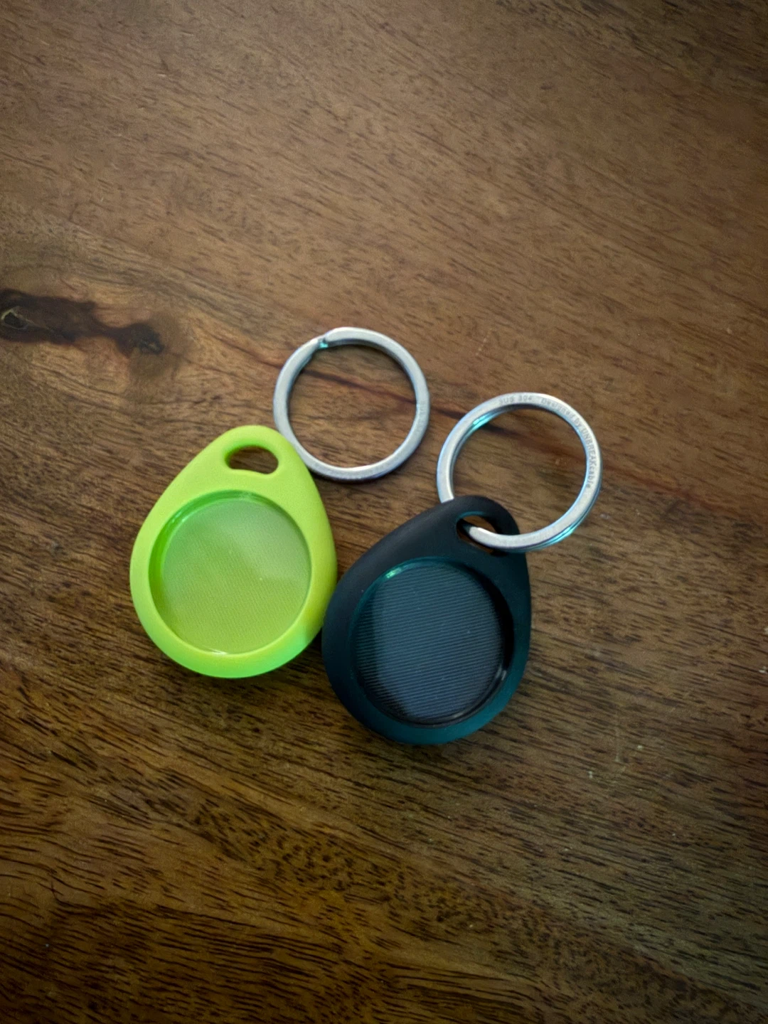 Two AirTag holders