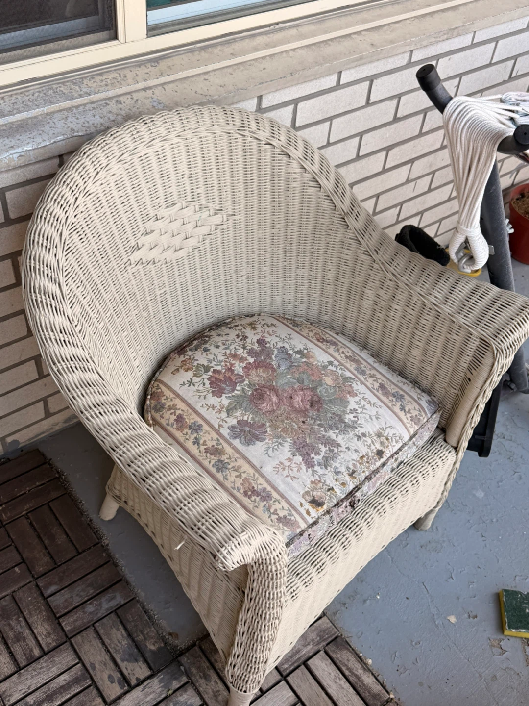 Wicker Armchair with Floral Cushion