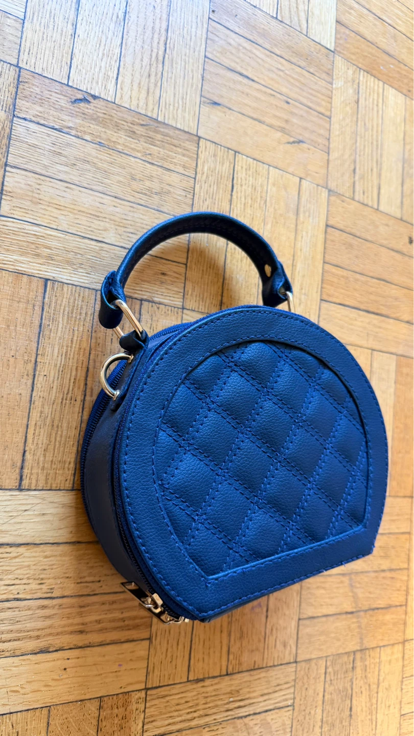 Blue Quilted Round Handbag with Strap