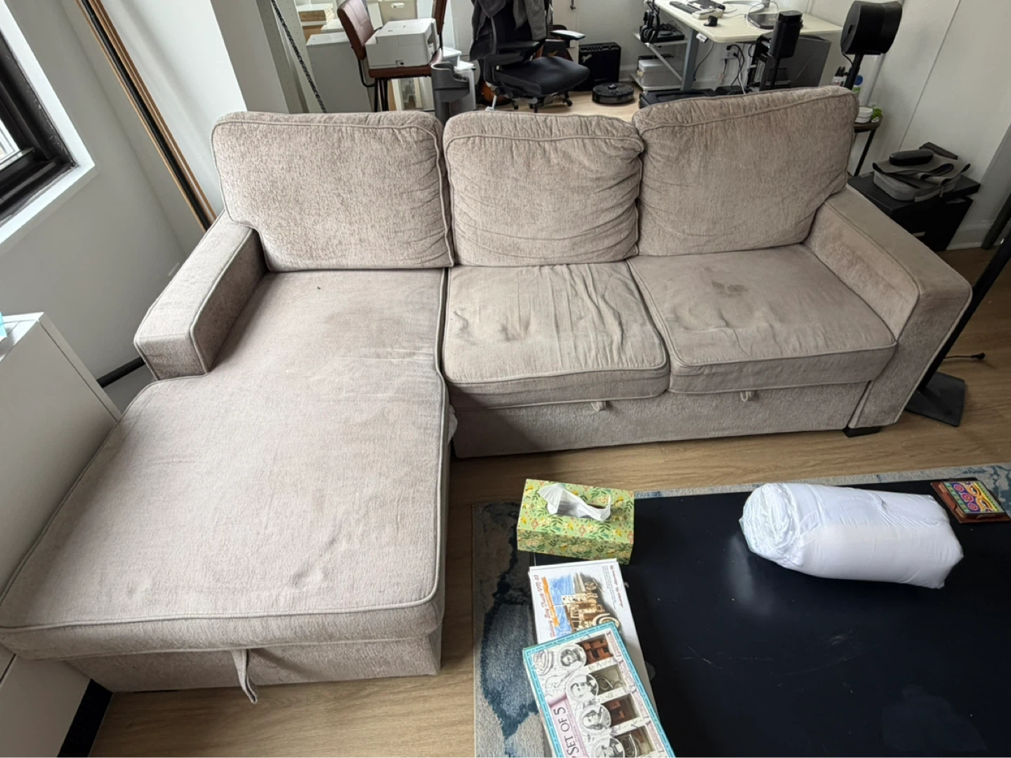 Gray chaise sofa with popup sleeper