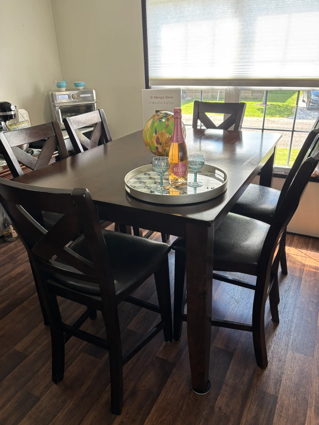 High pub style dinning table and 8 chairs