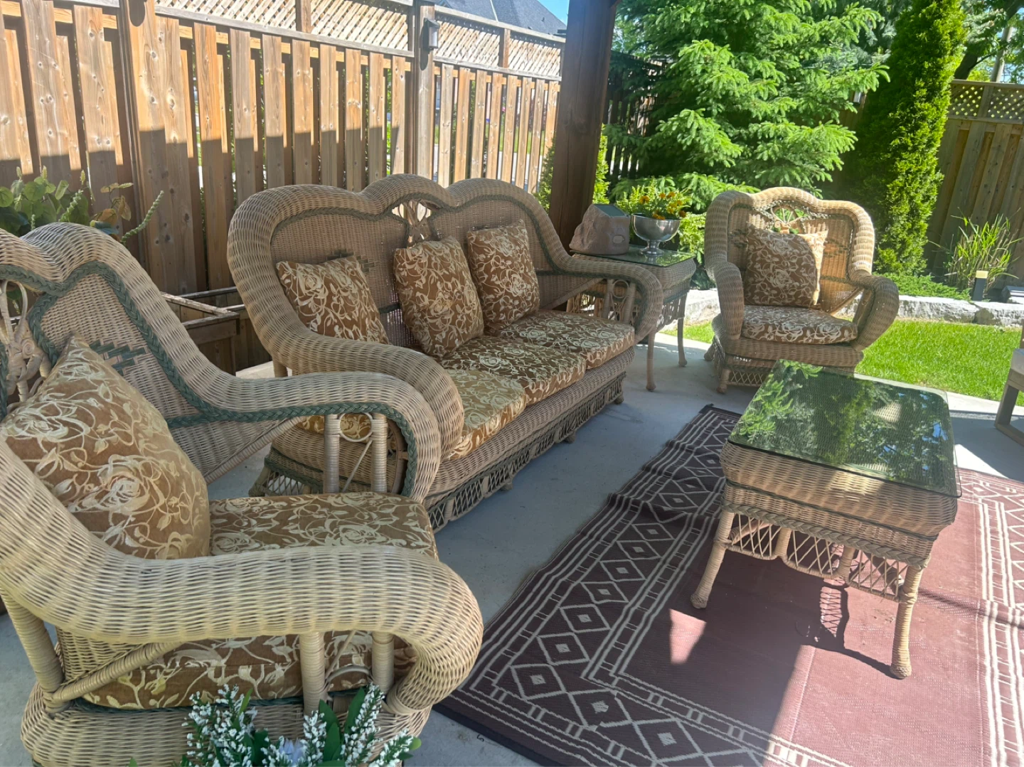Wicker patio furniture set with cushions