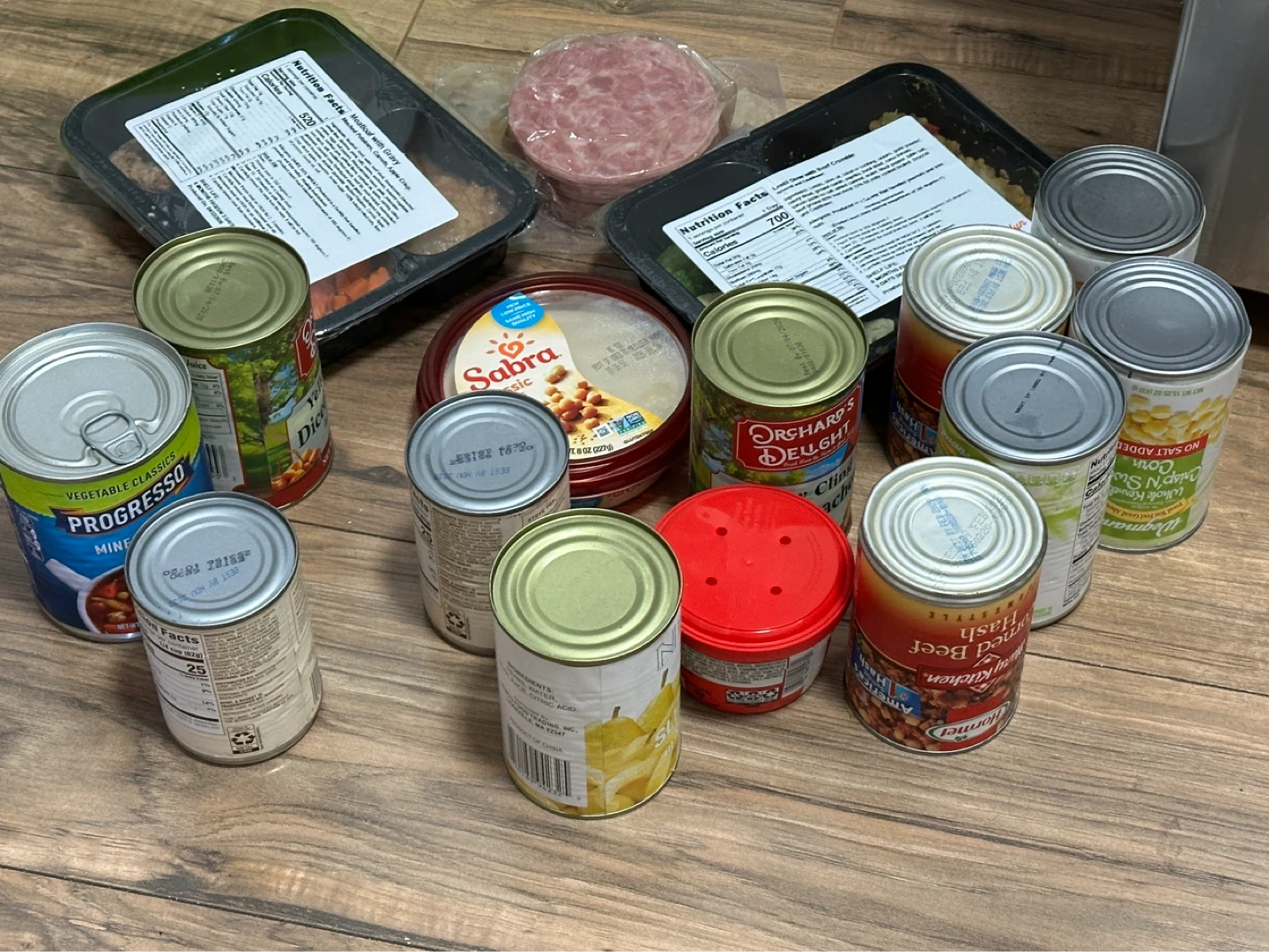 Assorted Canned Goods, Hummus, and Pre-packaged Meals