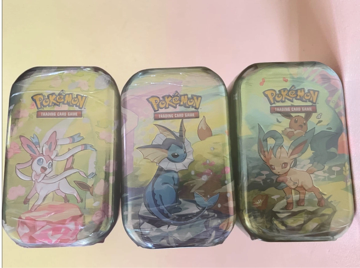Pokémon Trading Card Game Tins (Sylveon, Vaporeon, Leafeon)