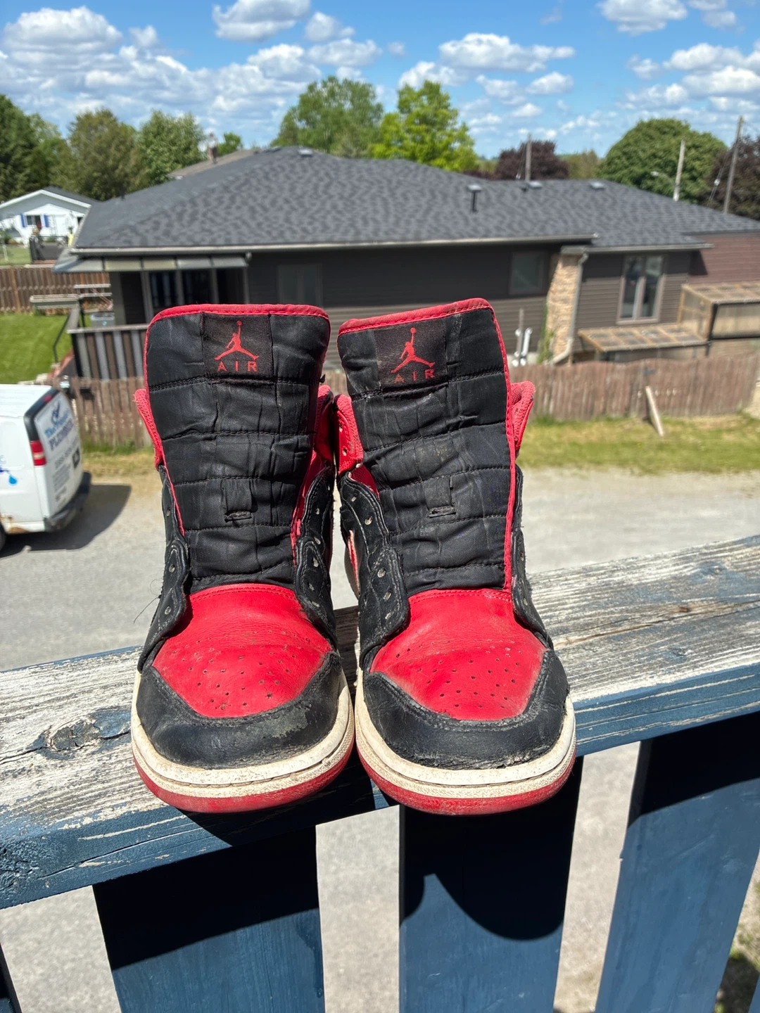 Air Jordan 1 Mid Red Black Sneakers