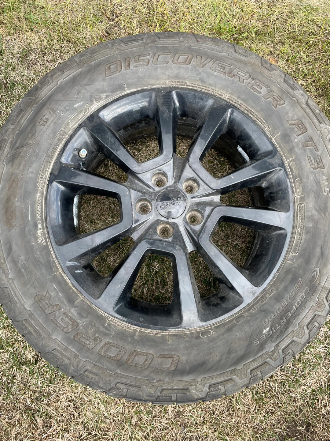Jeep Cooper Discoverer AT3 Tire with Black Rim