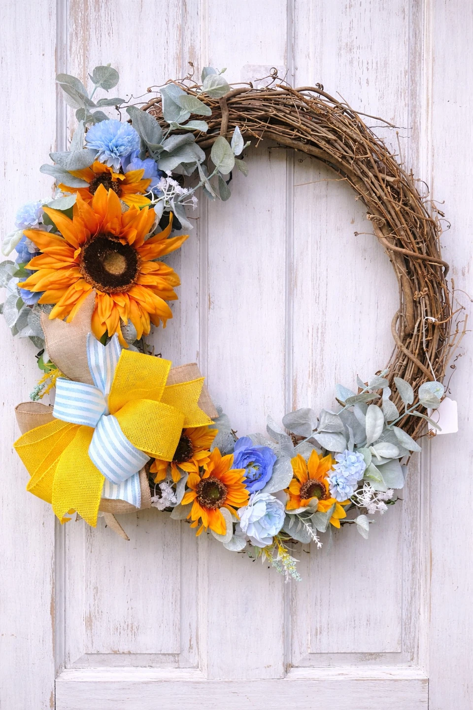 Decorative Wreath with Assorted Flowers and Bows