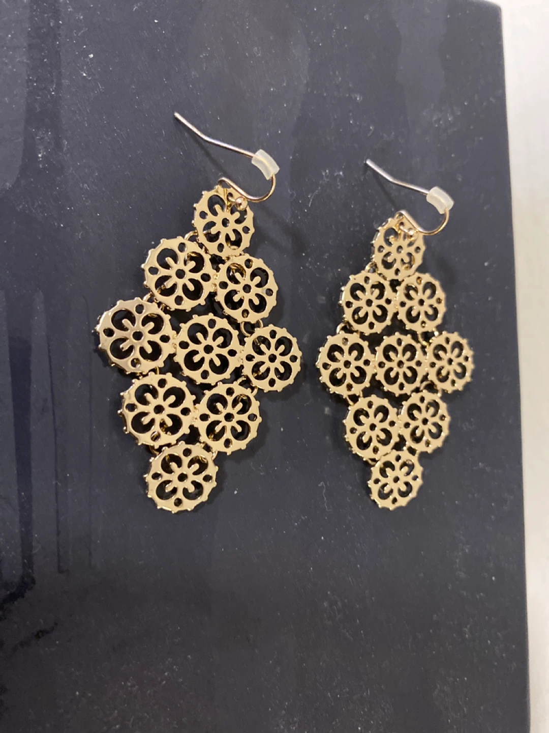 Gold tone filigree dangle earrings