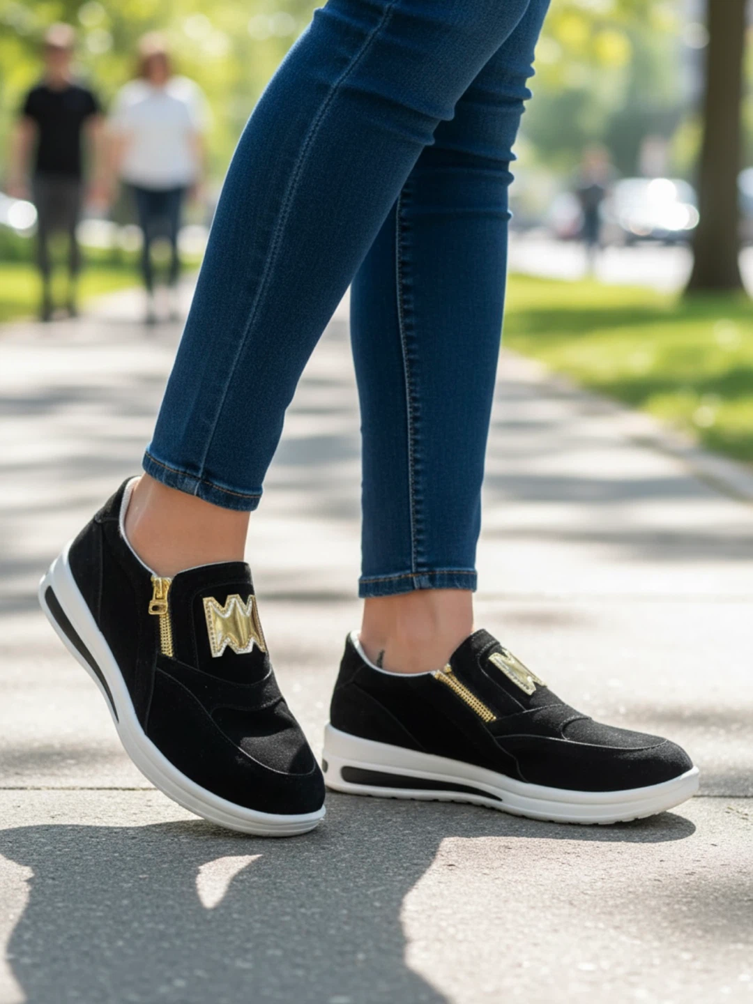 Black Suede Slip-On Sneakers with Gold Accents